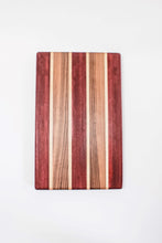 Load image into Gallery viewer, Handmade cutting board with strips of purpleheart, walnut and maple wood. 
