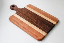 Load image into Gallery viewer, Handled handmade cutting board with walnut, cherry and hard maple.
