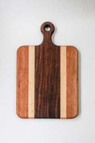 Handled handmade cutting board with walnut, cherry and hard maple.